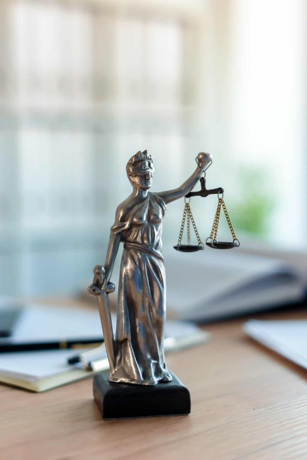 lady justice statue in law firm office.jpg
